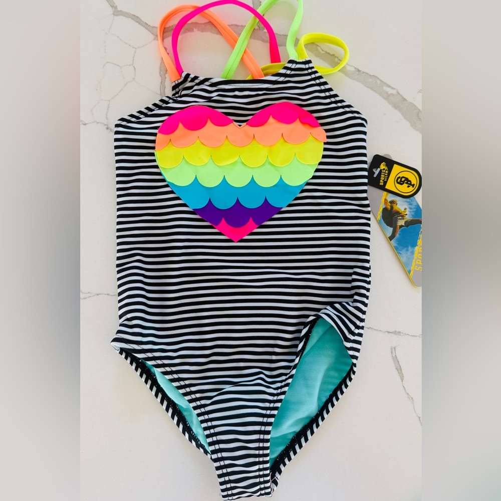 The cutest girls swim suit with contrasting black and white stripes. Never worn